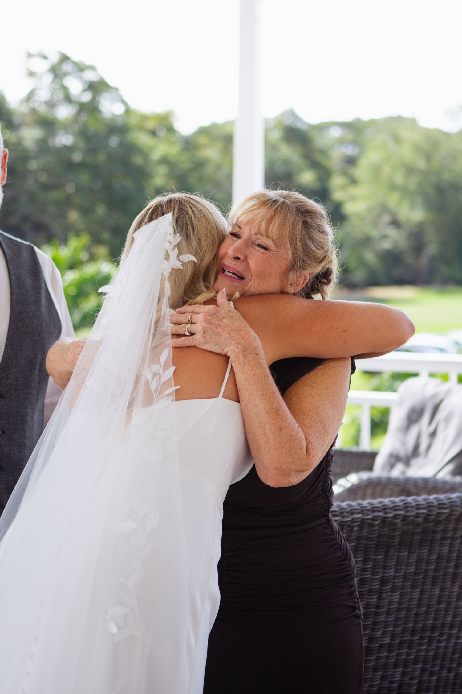 Emotional hug with mother of the bride and bride at Port Douglas country wedding
