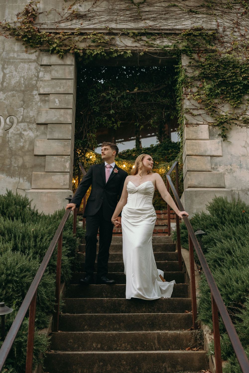 Bride and groom share a quiet moment at Summerour studio, an Atlanta wedding venue