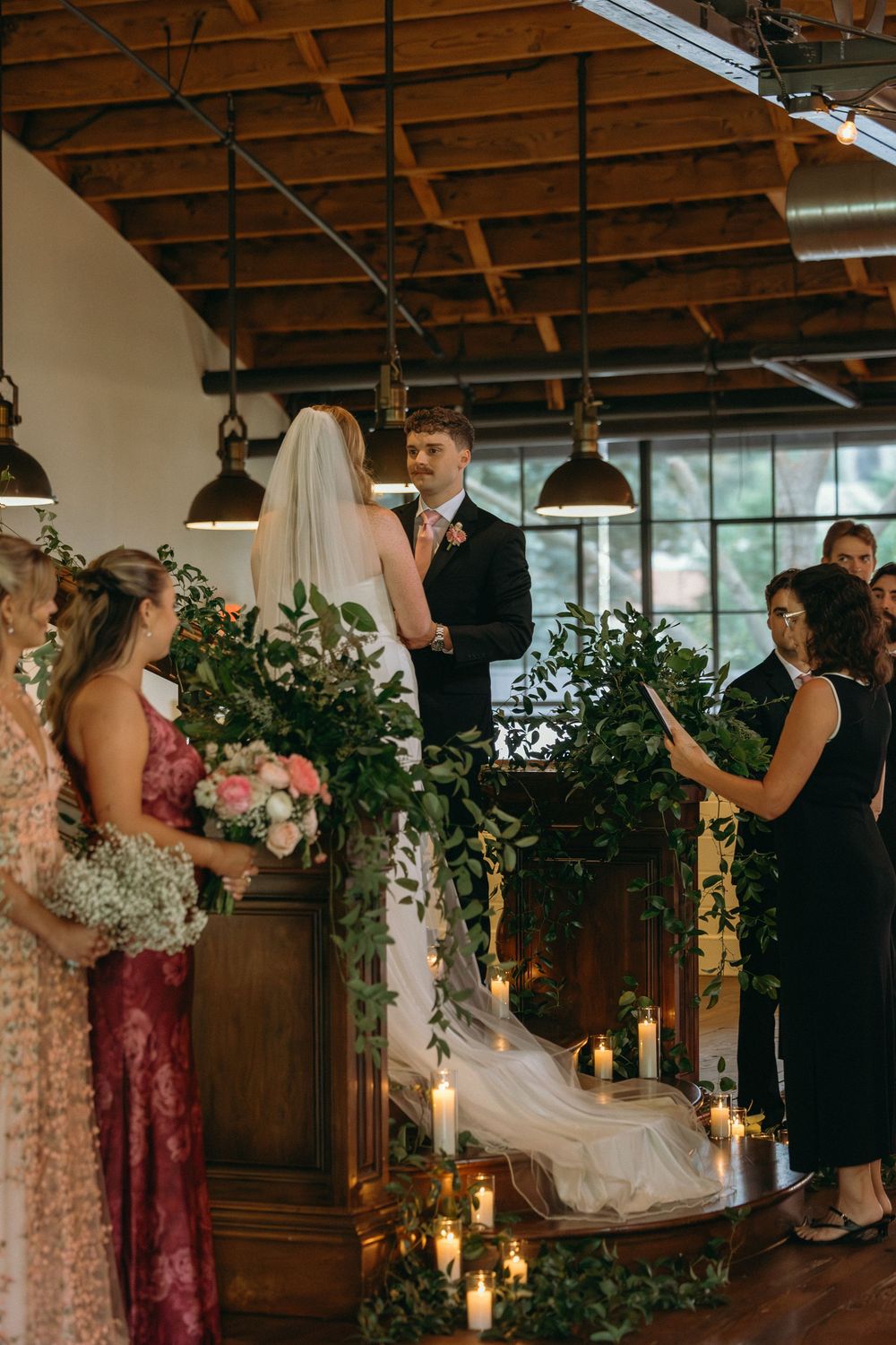An indoor wedding ceremony at Summerour Studio in Atlanta, Georgia