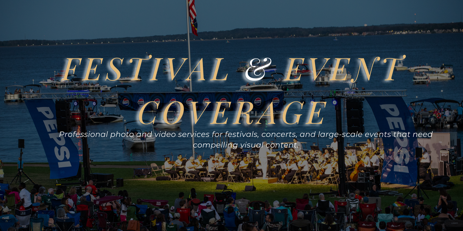 A scenic aerial view of a coastal festival event with boats and waterfront activities at sunset.
