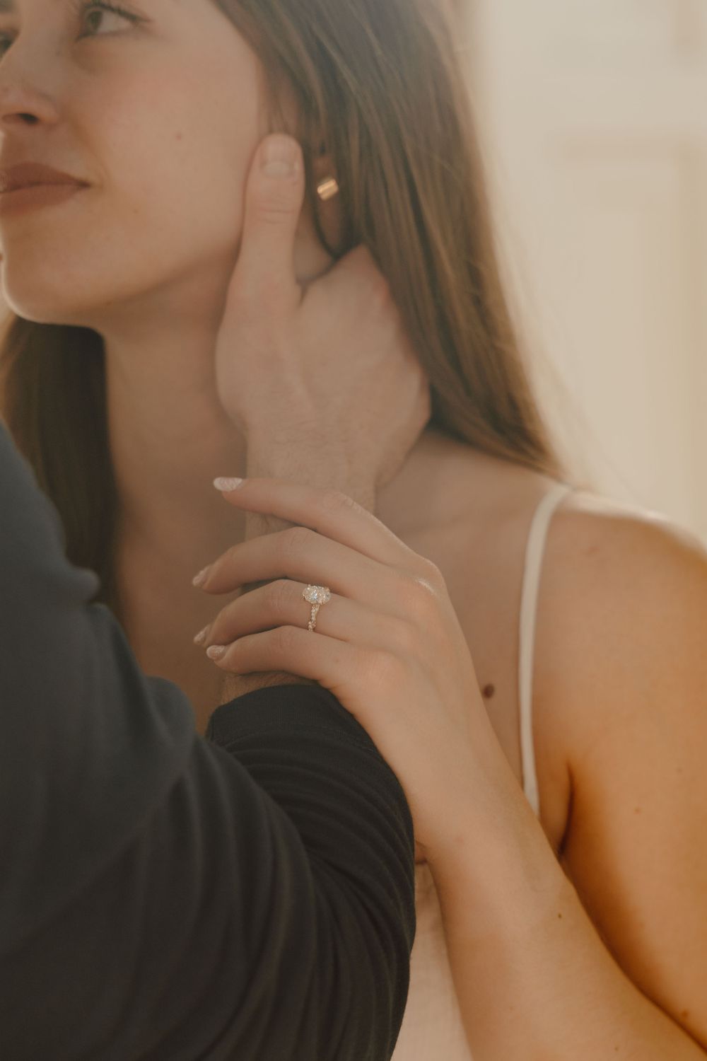 Documentary engagement photography capturing candid moments and natural connection during a relaxed lifestyle session.