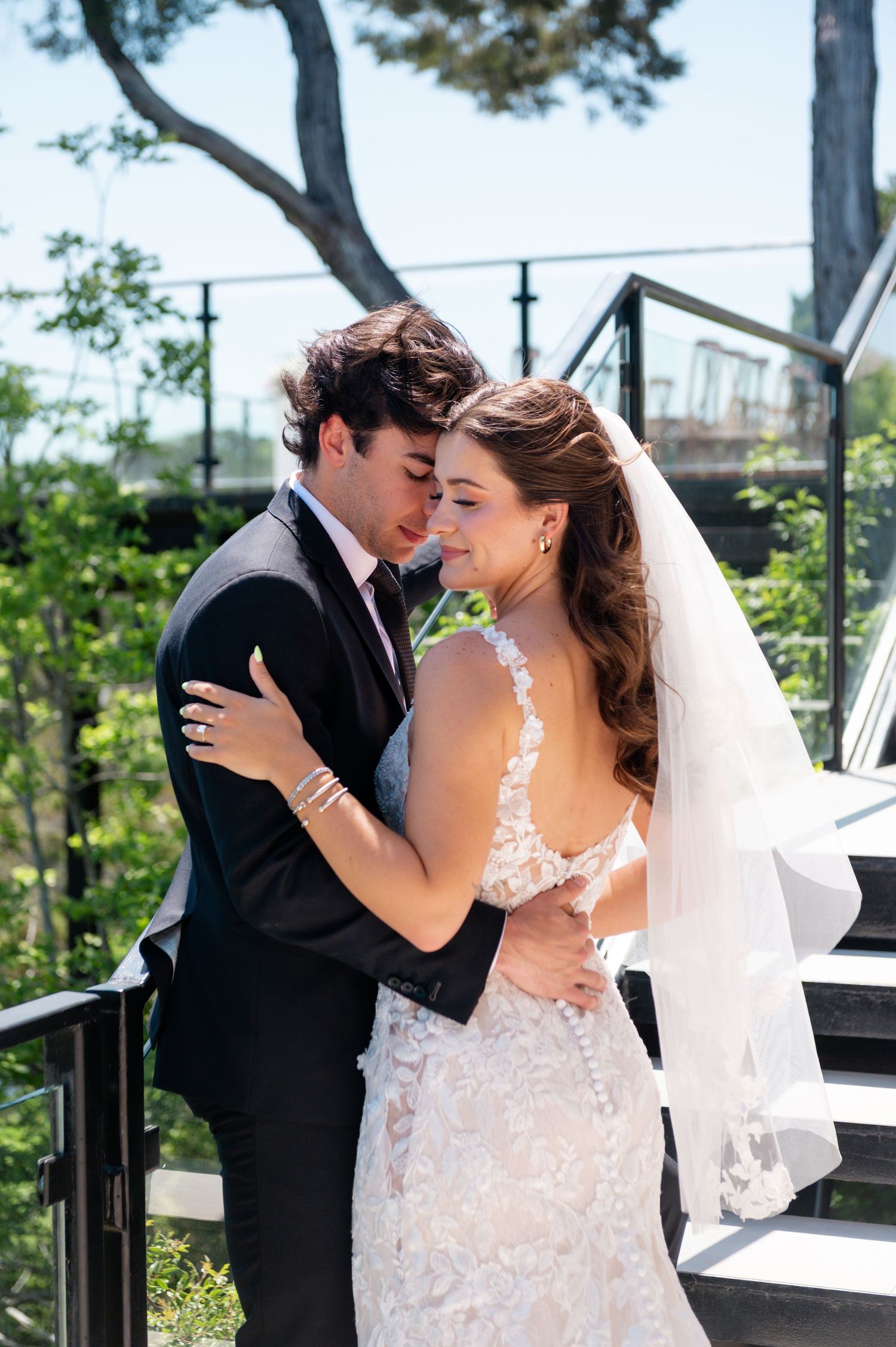 Bride and groom portraits outside with beautiful hill country views of The Videre Estate in Wimberley Texas.
