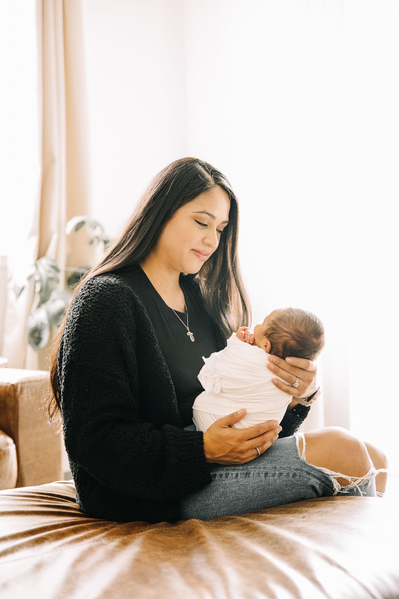 newborn lifestyle photoshoot of baby boy with his mother. Greeley colorado new born photography