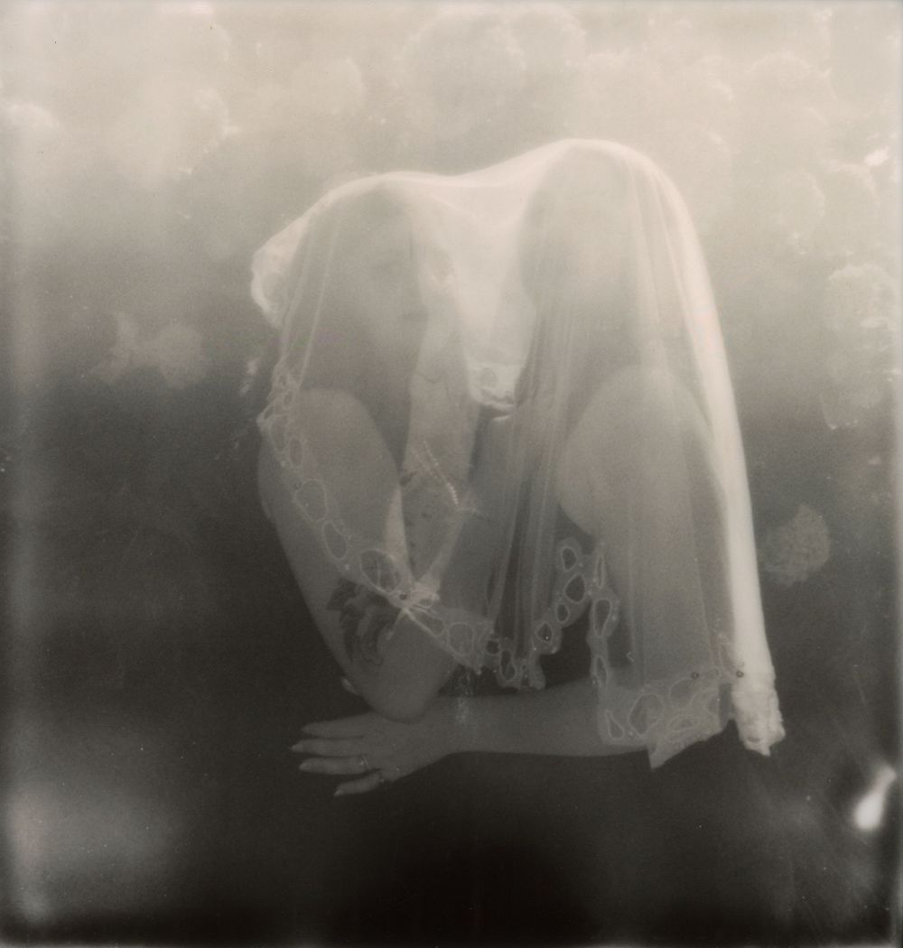 Ethereal black and white photographs showing flowing fabric in motion.