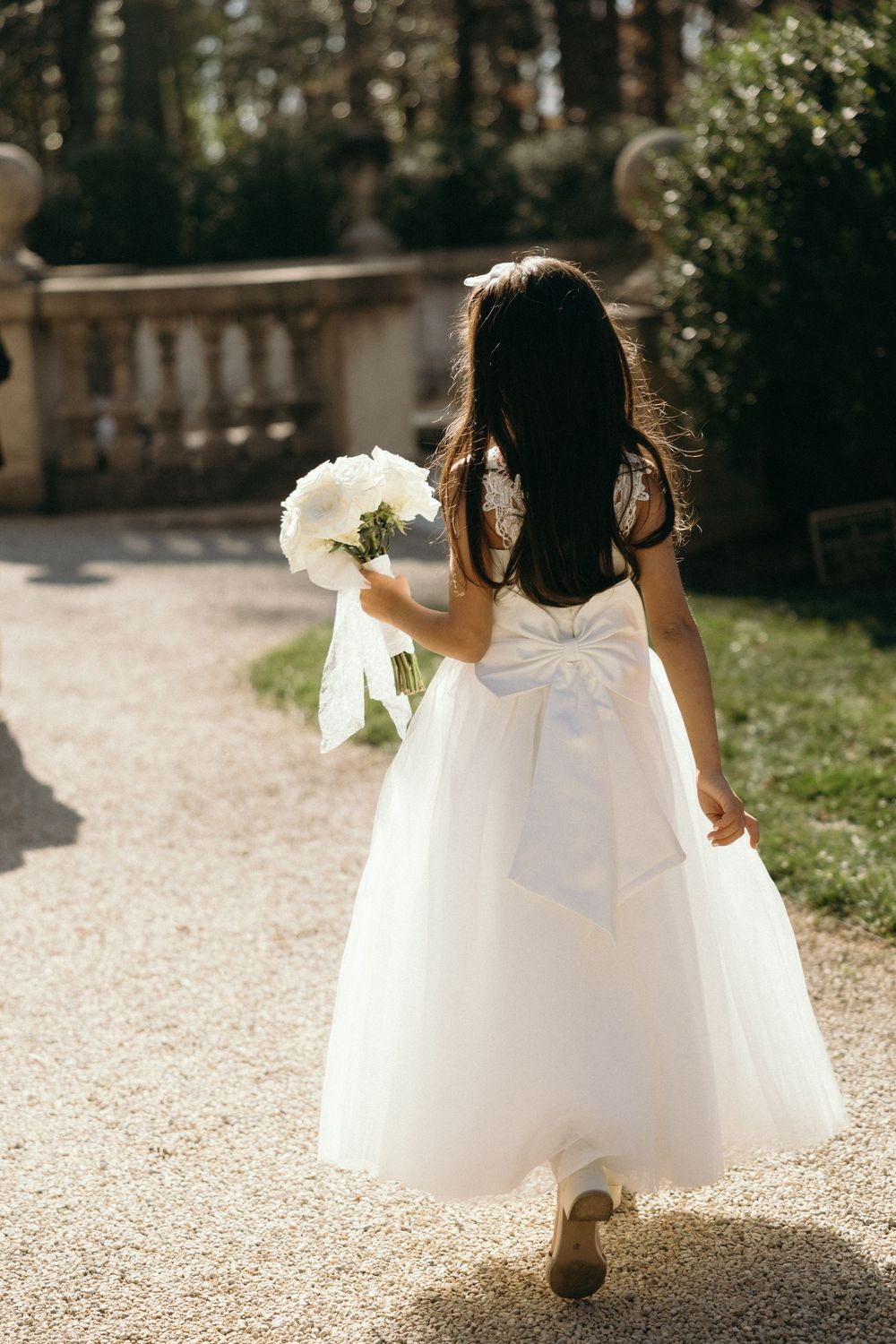 Flower girl on the steps of the Swan House in Atlanta, GA.