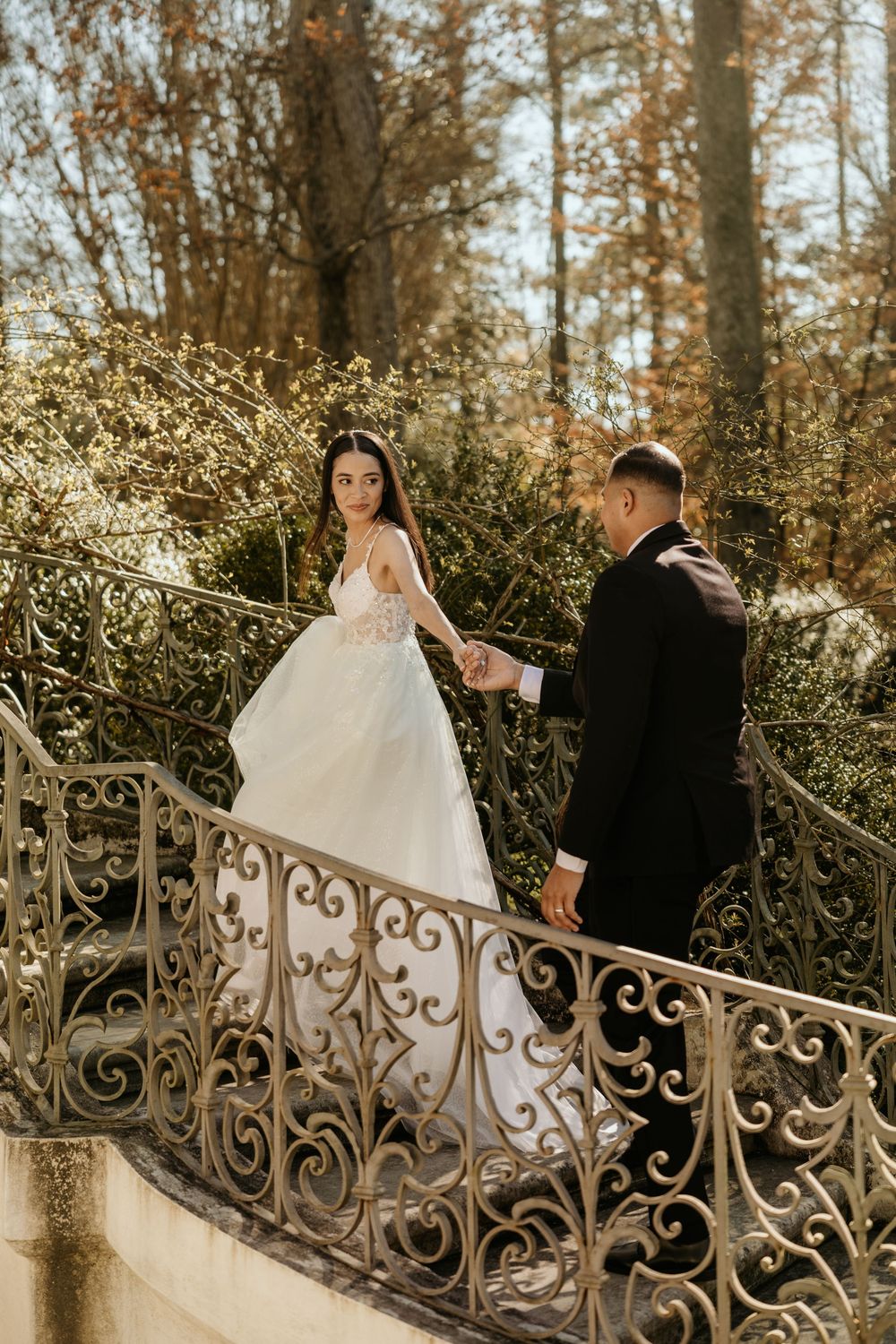 Bride and Groom on the staircase of the Swan House in Atlanta, GA.