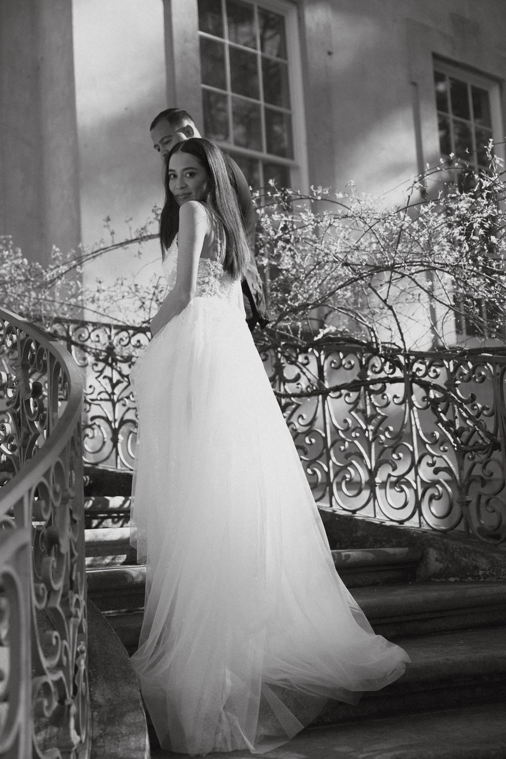 Bride and Groom on the stairs of the Swan House in Atlanta, GA.