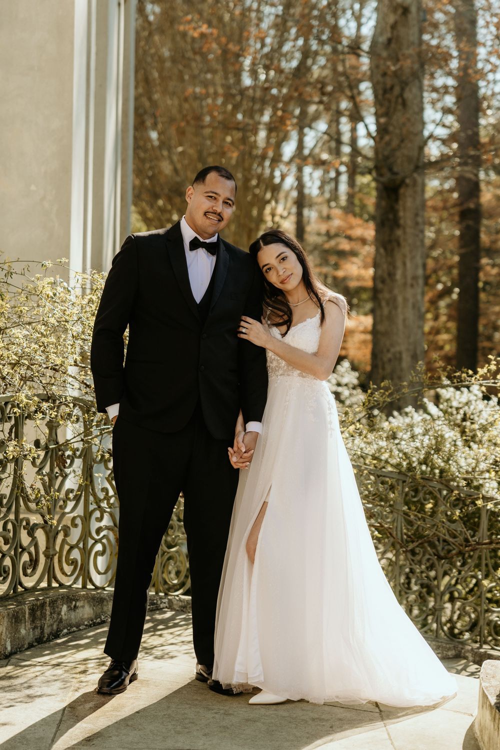 Bride and Groom on the steps of the Swan House in Atlanta, GA.