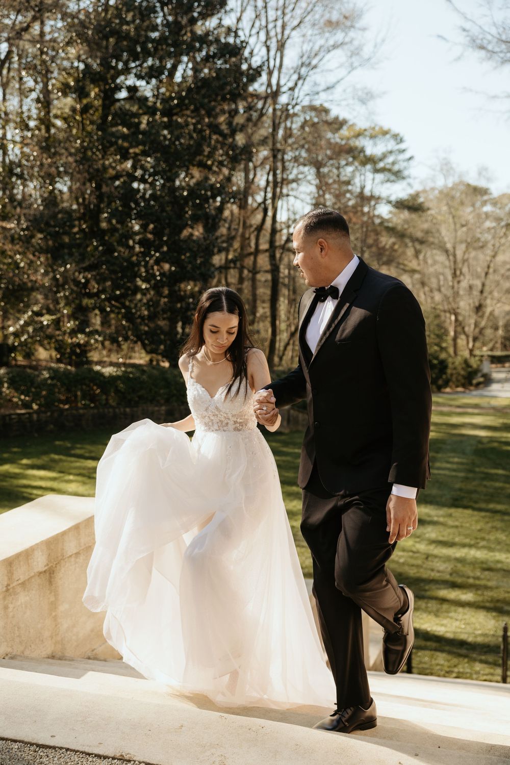Newlyweds on the staircase at the Atlanta History Center in Atlanta, Ga.