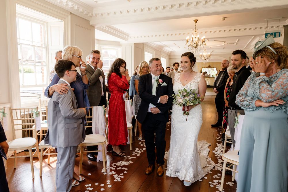Bride's entrance at ceremony at at Gildredge Manor