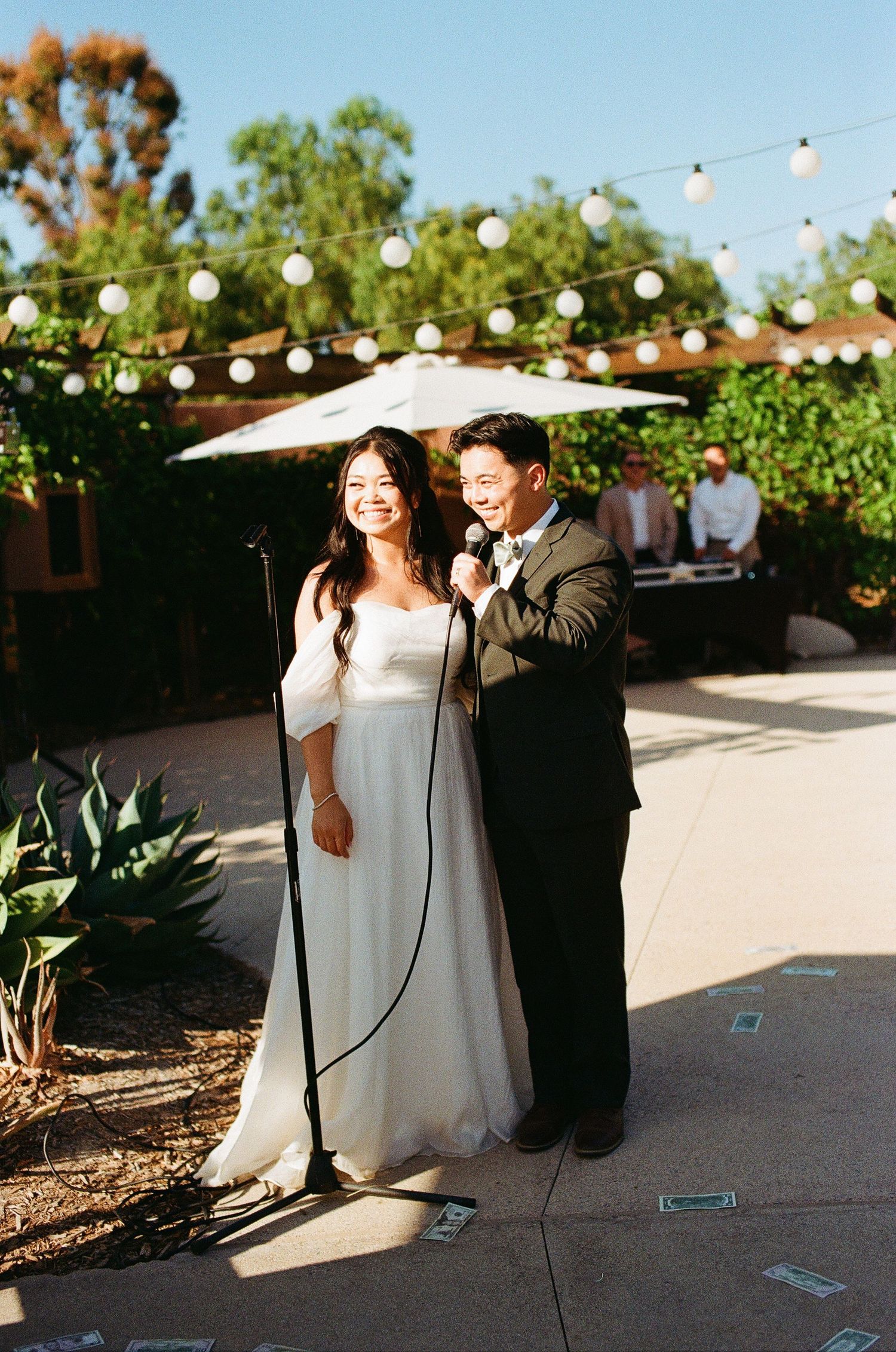35mm film picture of the bride and groom giving their heartfelt speech to guests at the Aliso Viejo Gold Coast Farms wedding.