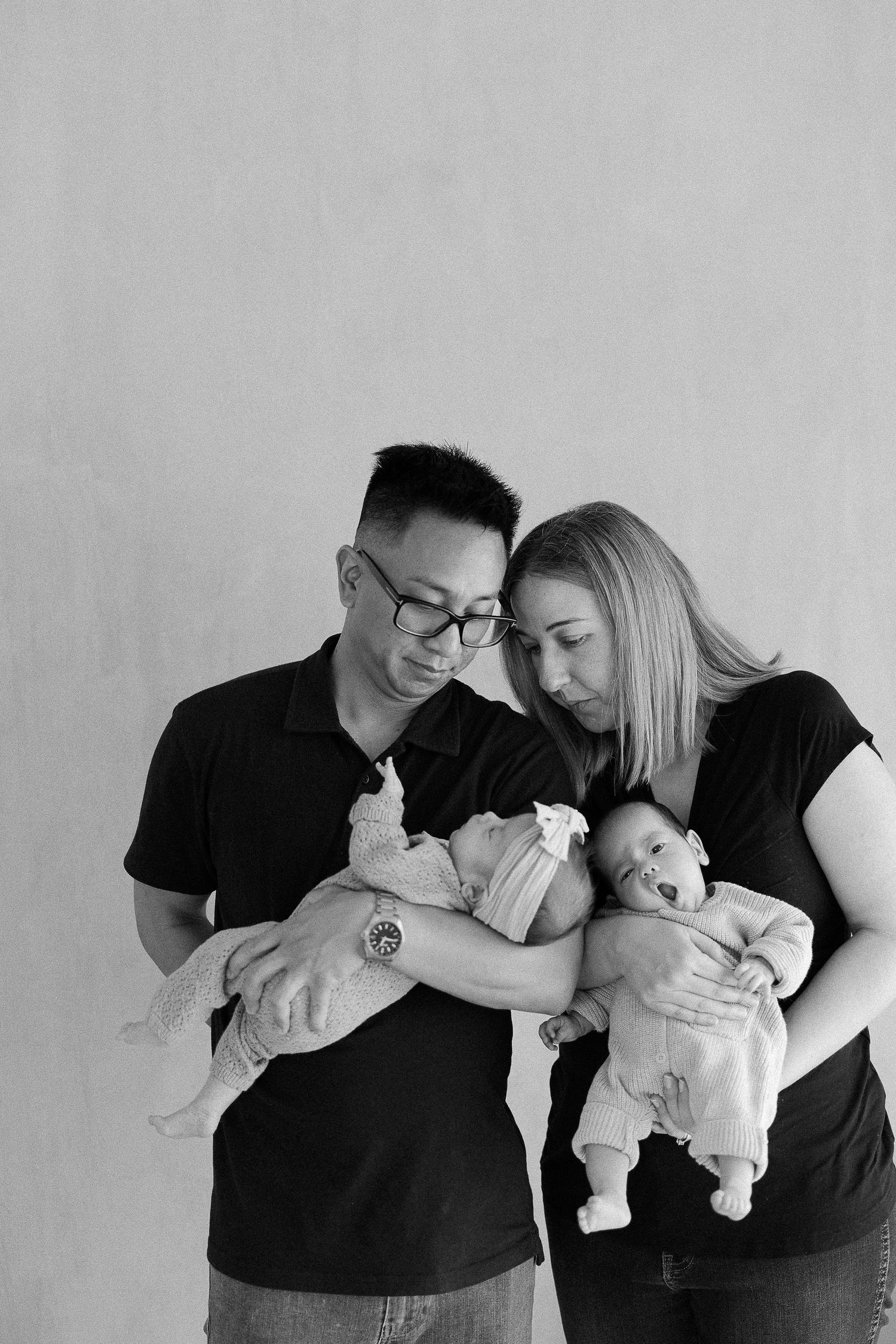 Orange County photographer capturing natural family newborn photos with parents and their newborn