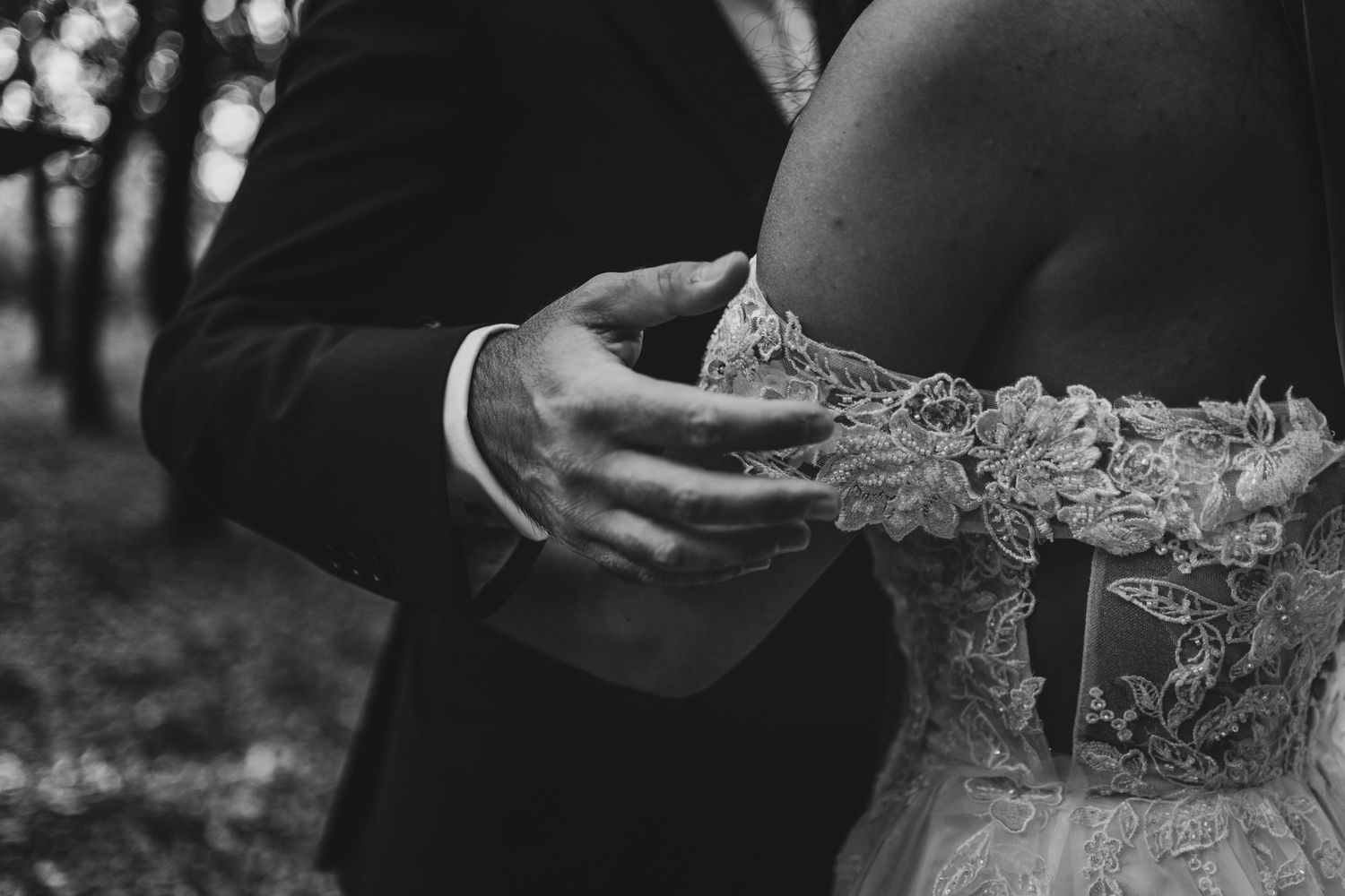 A black and white photo collage showing candid moments at a wedding reception with dancing and celebration.