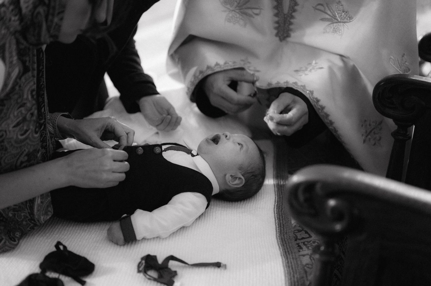 Black and white overhead shot of a religious ceremony taking place.