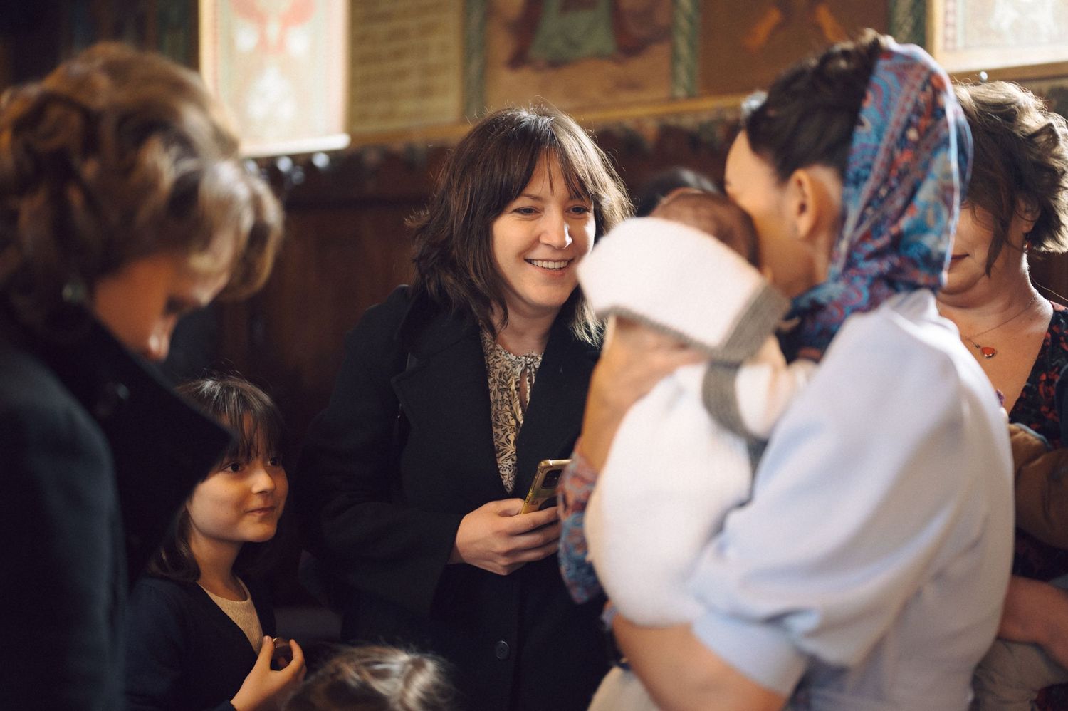 Group of people gathered together during a church celebration event.