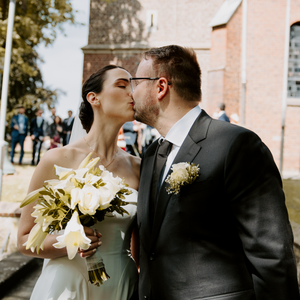 A romantic wedding photo collage showing tender moments between a couple with white floral bouquets.
