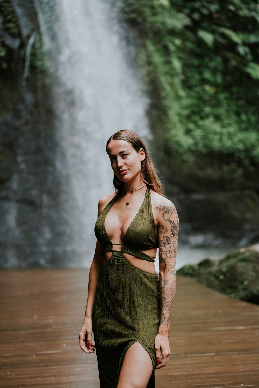 Solo portrait photography in Bali with waterfall background