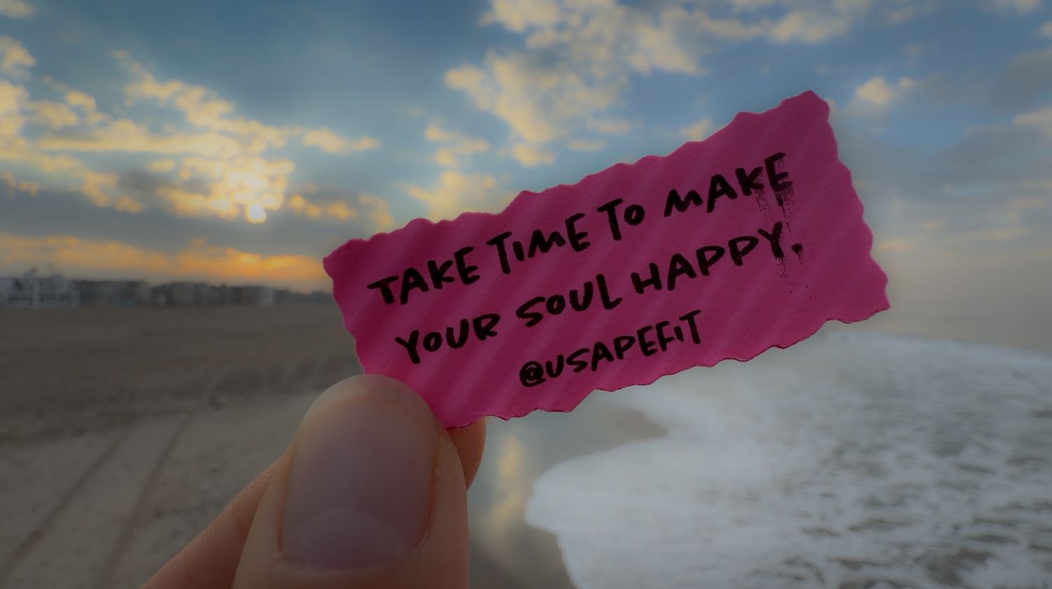 A series of pink sticky notes with inspirational messages displayed against a sunset beach background.