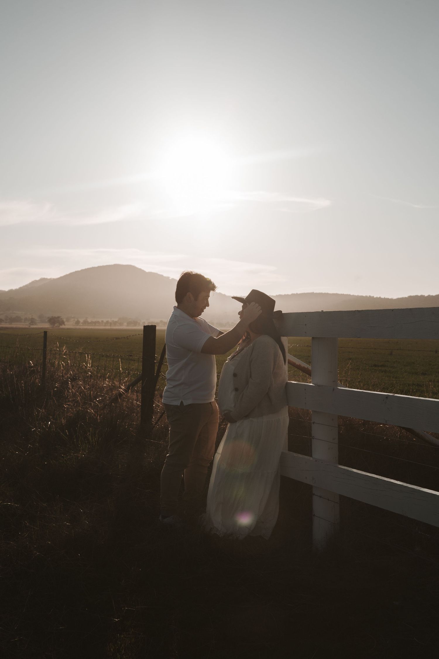 Country couple photoshoot, western couples photography, rustic romance, cowboy and cowgirl, countryside love story, golden hour portraits