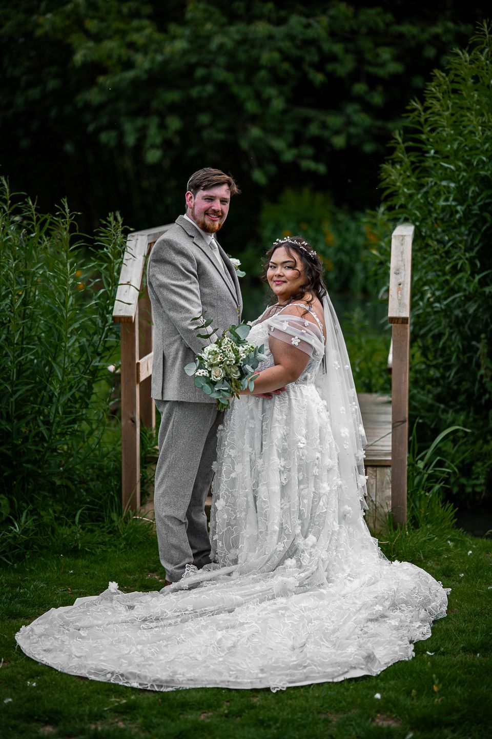 Dorset Wedding photographer, Kris the photographer, capturing a bride and groom on their wedding day in Bridport in Dorset