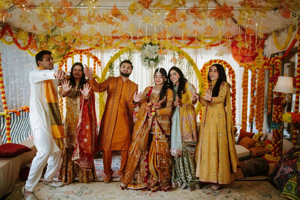 A panoramic view of a traditional Indian wedding ceremony with colorful decor and guests in festive attire.