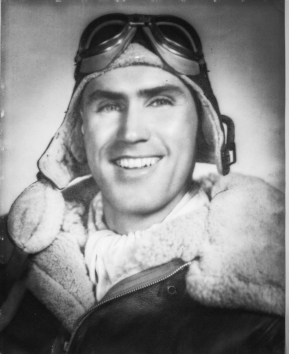 Vintage black and white portraits of aviators wearing flight gear.