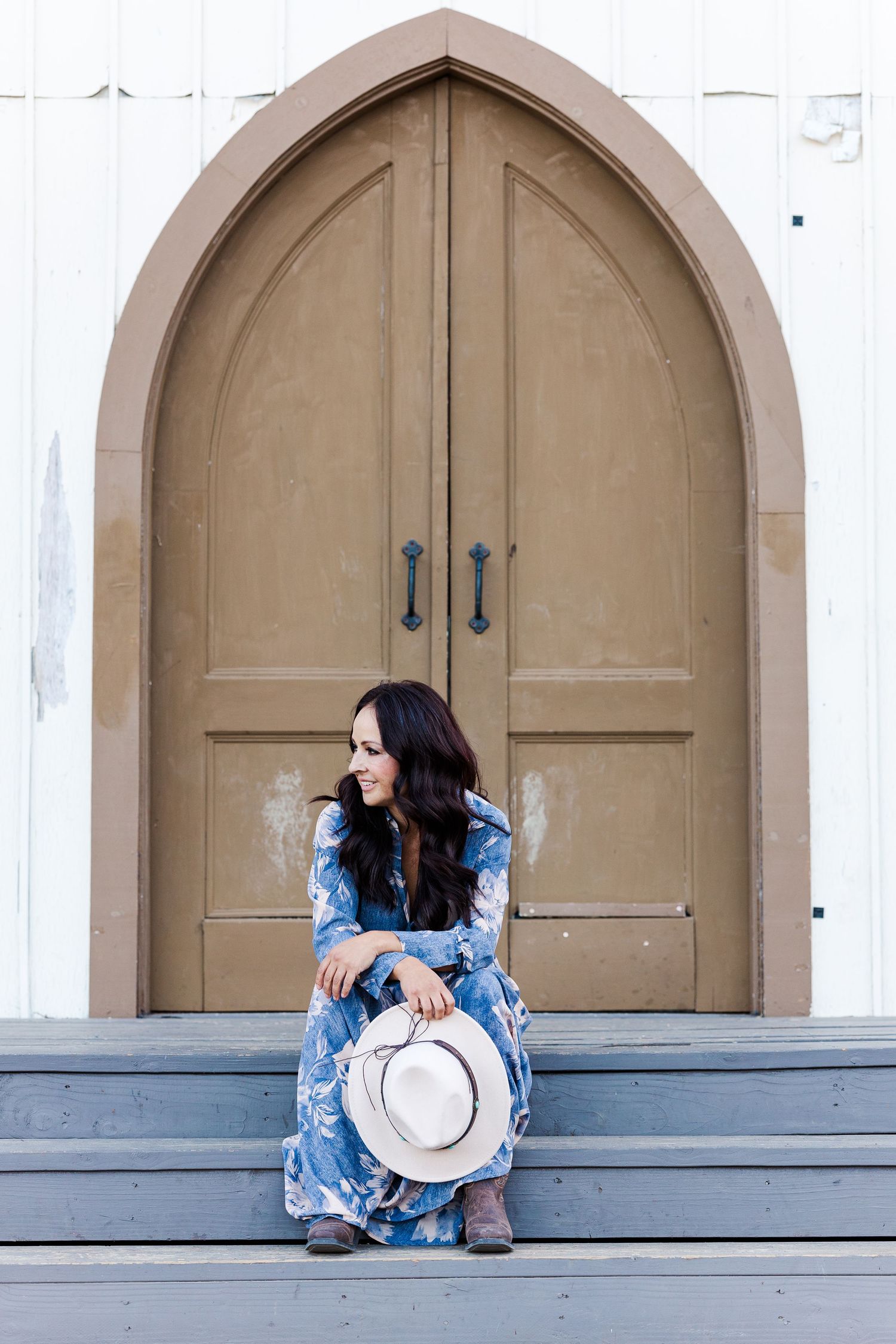 A high school senior enjoying a professional outdoor photoshoot in Simi Valley, CA, captured in soft natural light.