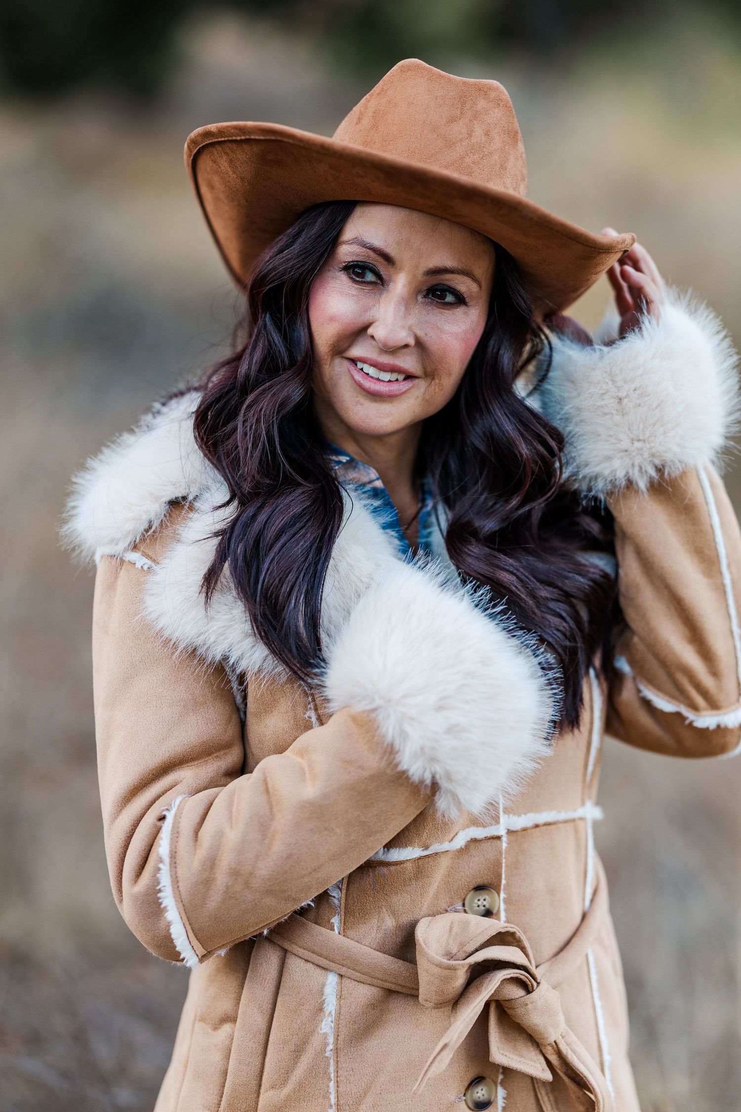 A high school senior enjoying a professional outdoor photoshoot in Simi Valley, CA, captured in soft natural light.
