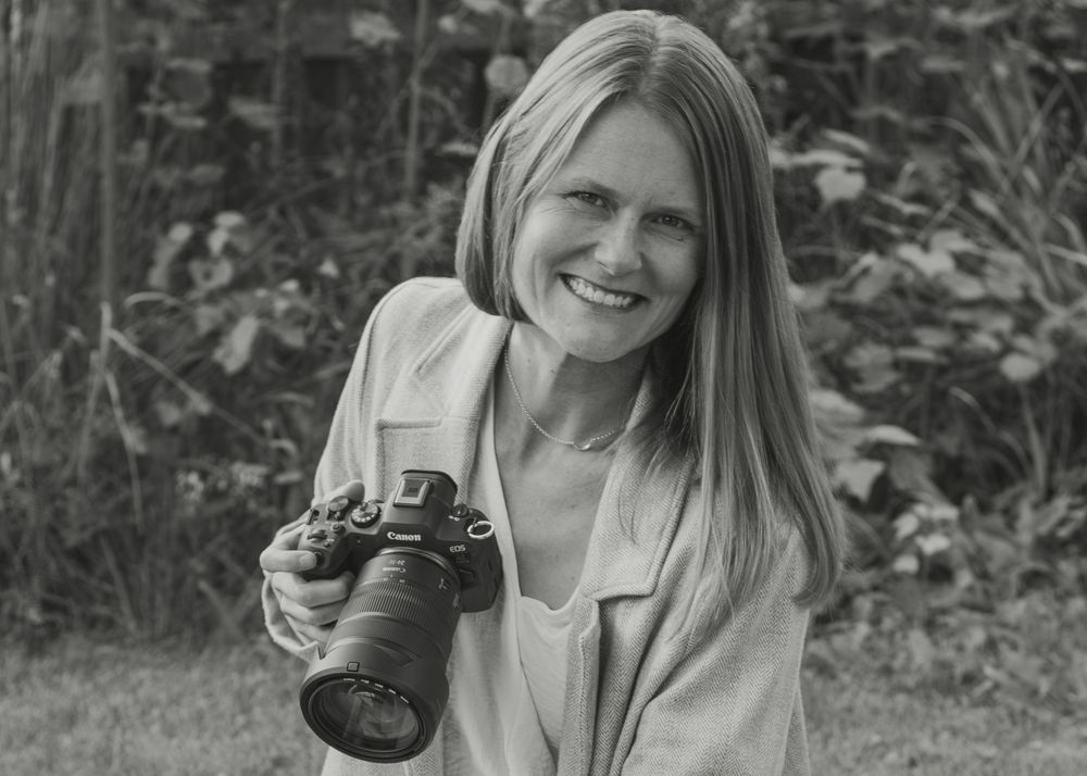 Black and white portrait series showing someone holding a camera outdoors.