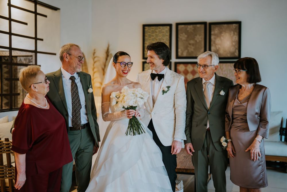 Wedding ceremony moments captured with guests and wedding party in formal attire.