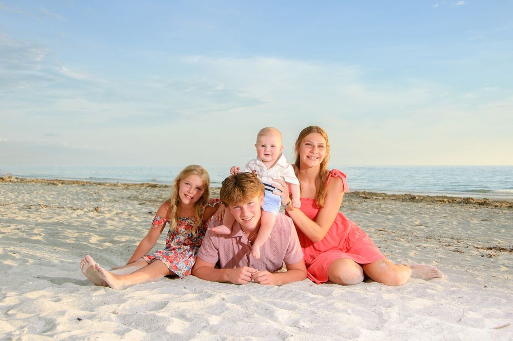 photo of siblings together on beach in New Port Richey