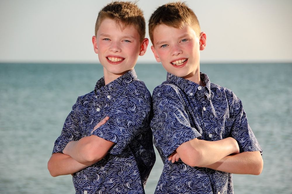 photo of twin boys in front of gulf in New Port Richey