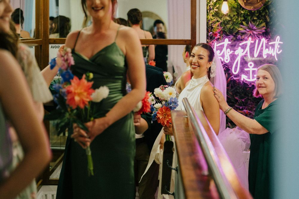 wedding at Noosa Boathouse with river views, photographed by a storytelling wedding photographer.”