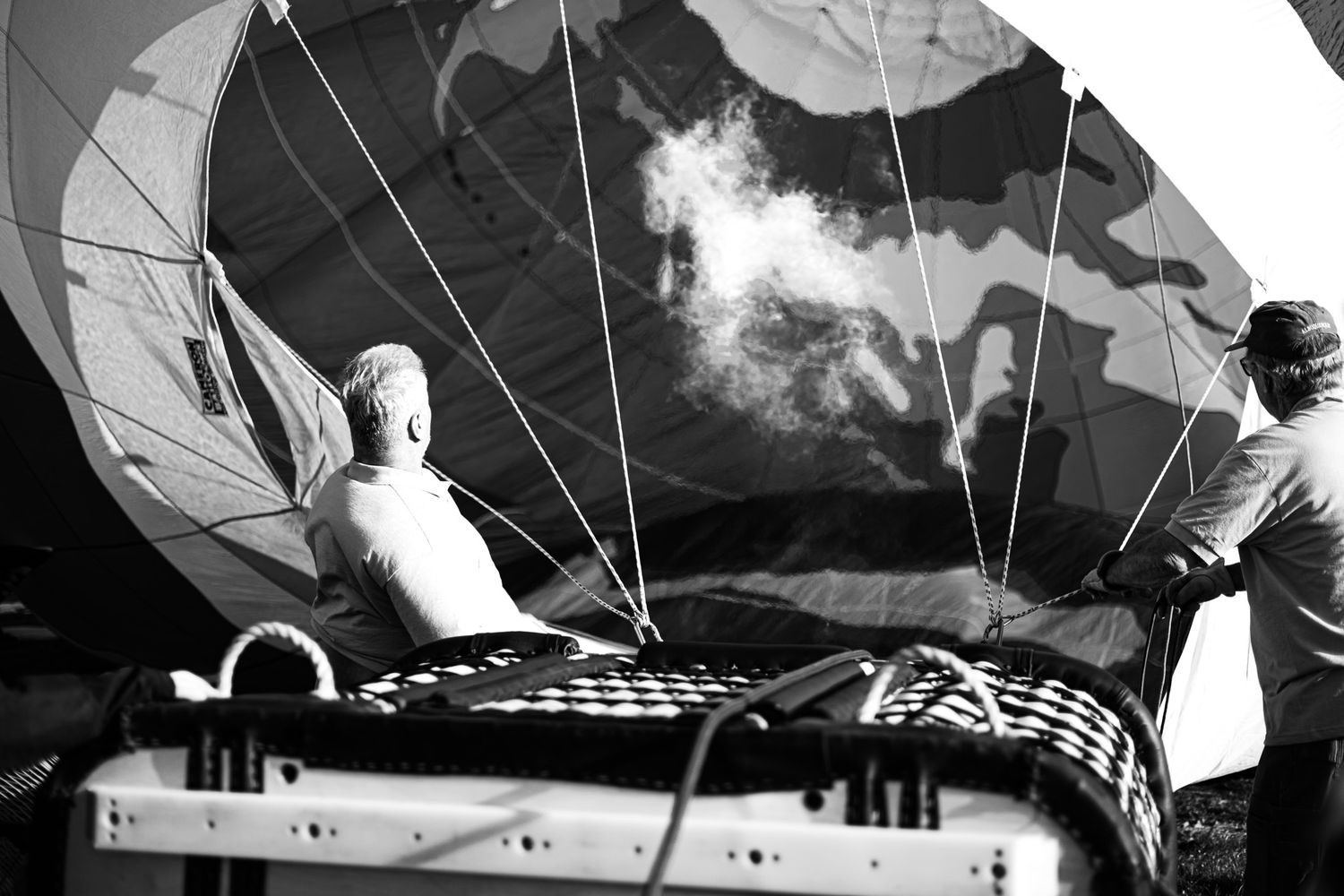 Hot air balloon warming up for take off by Memorari Portrait