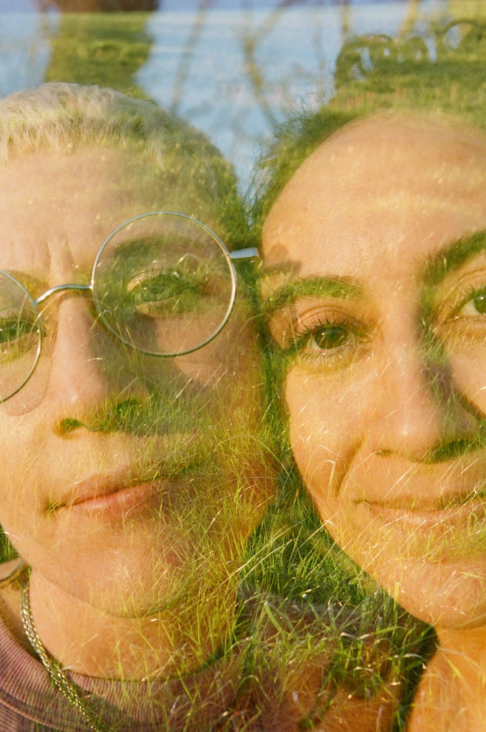 Queer love anniversary shoot in Perth, Sarah and Viviane photographed outdoors in golden light.