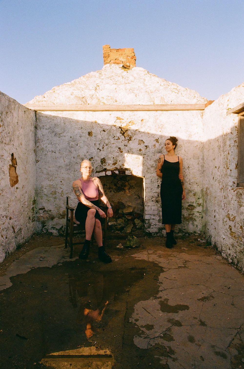 Soft golden hour portrait of two women in love, LGBTQ+ friendly anniversary session in Perth.