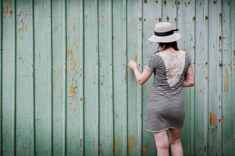 peeling paint, rustic backdrop, vintage wall, textured portrait, editorial shoot, weathered wood, countryside photoshoot