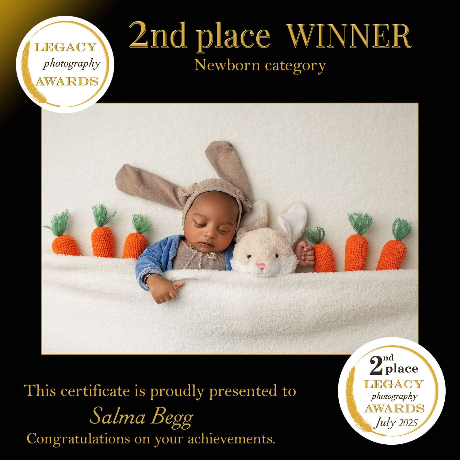Award certificate displays newborn category with carrot decorations and white fabric styling elements. baby, newborm cute, easter