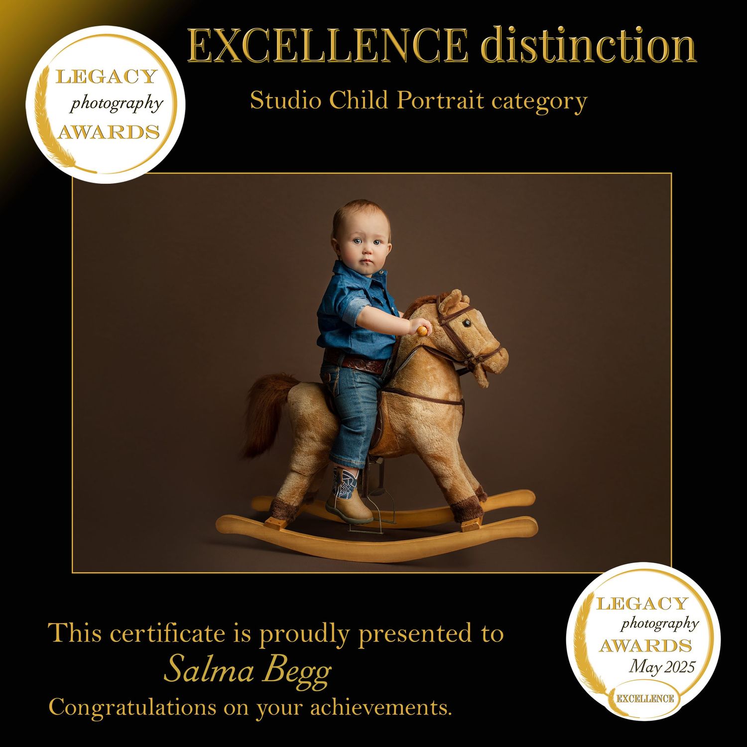 Award certificate showing excellence distinction in Studio Child Portrait category with rocking horse portrait. bull roping baby denim jeans