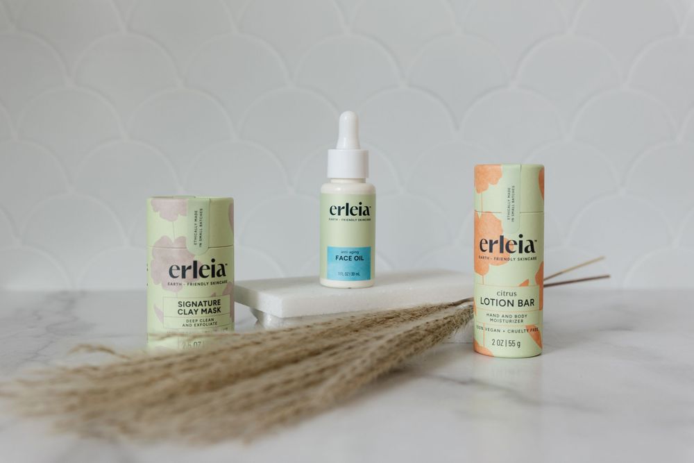 3 beauty products in a row with decorative wheat