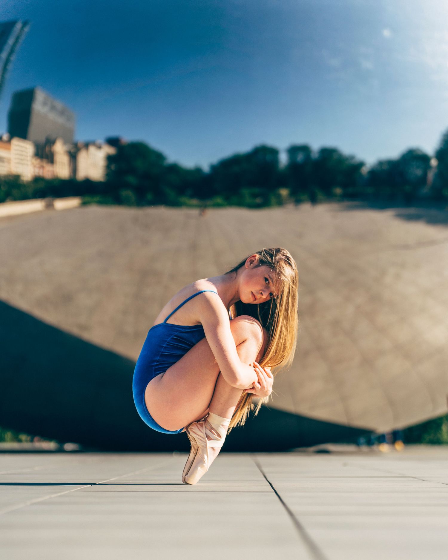 chicago dance photographer 14-year-old ballet student posing in front of Chicago’s iconic Bean sculpture for joffrey summer intensive