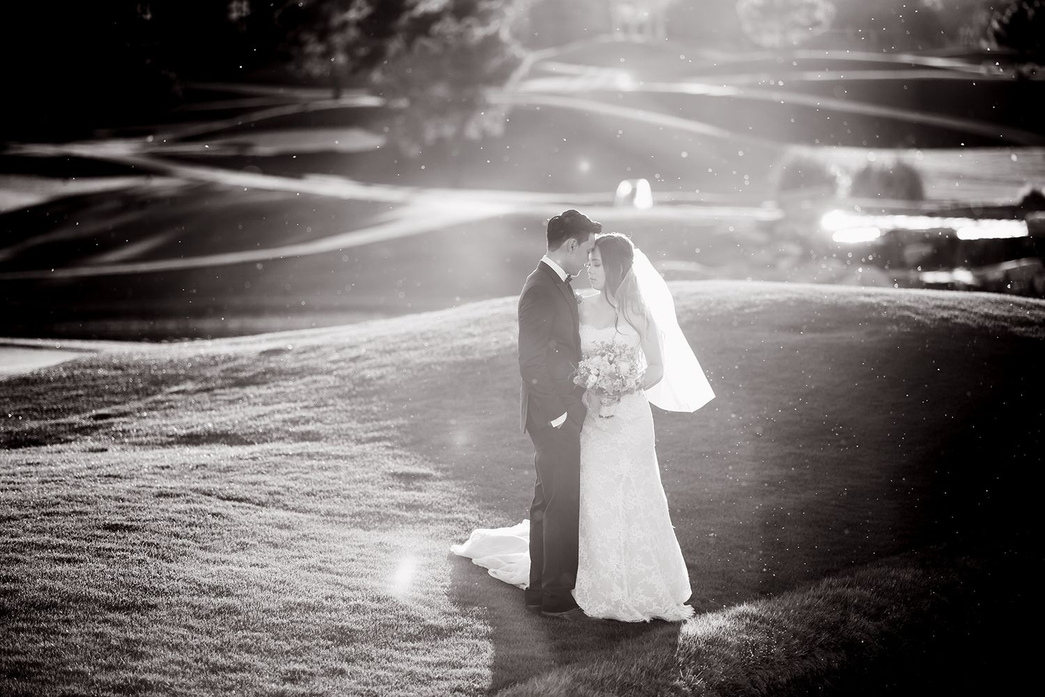 A black and white wedding photo sequence shows a couple dancing together on an illuminated dance floor at night.