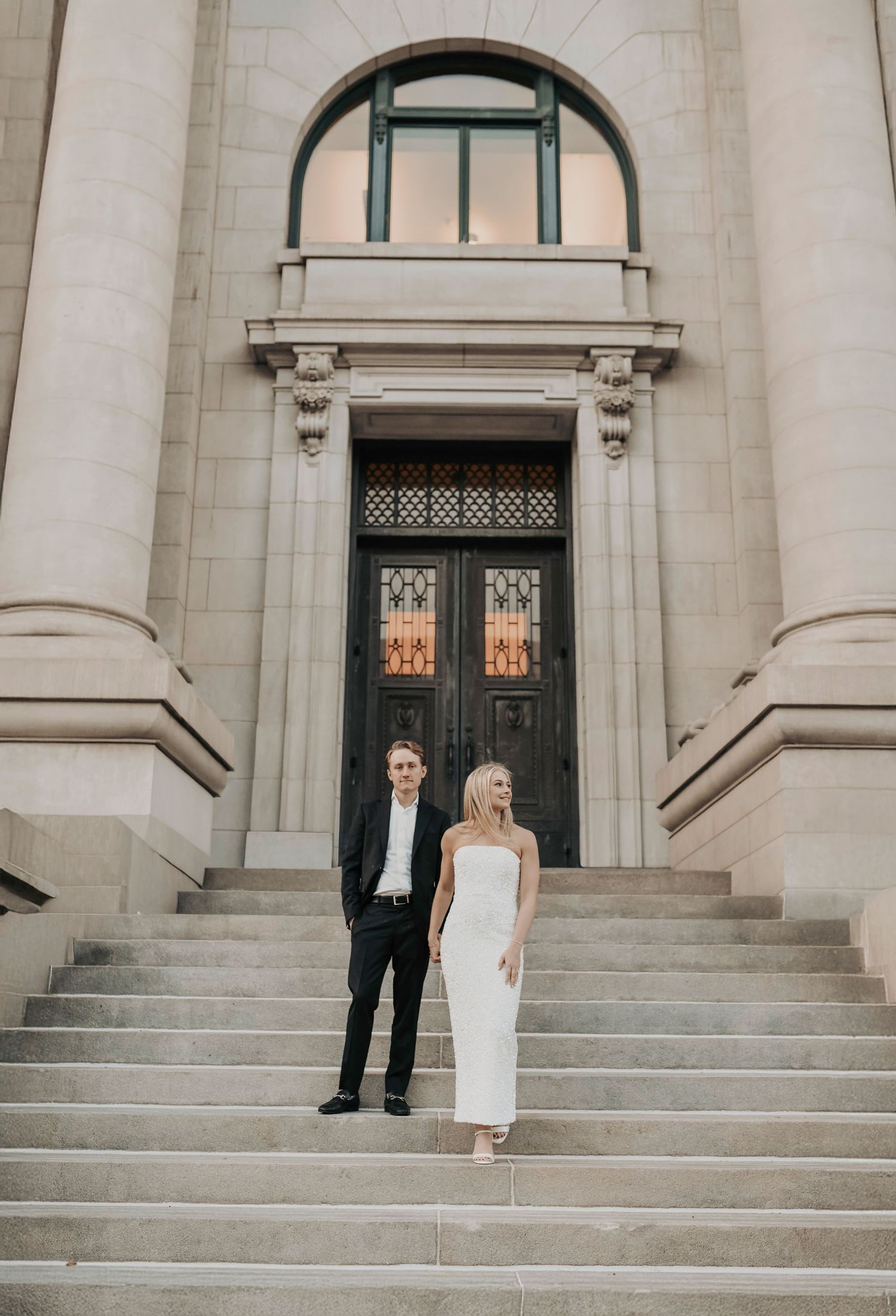 Editorial engagement session of couple in historic downtown Dallas arts district