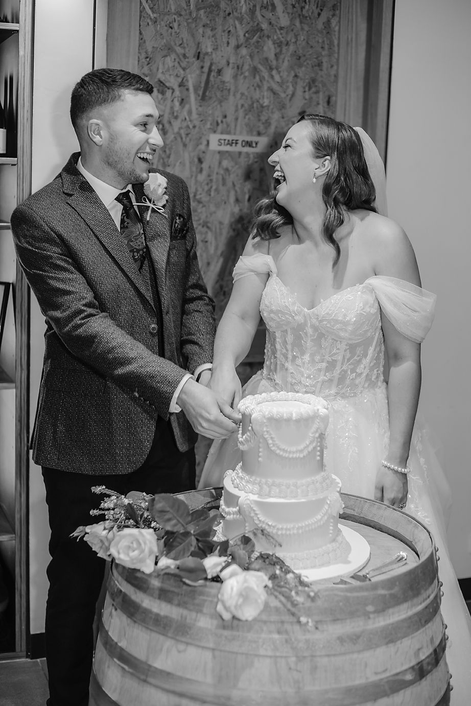 Black and white sequence of photos showing newlyweds sharing wedding cake during traditional cake cutting ceremony.