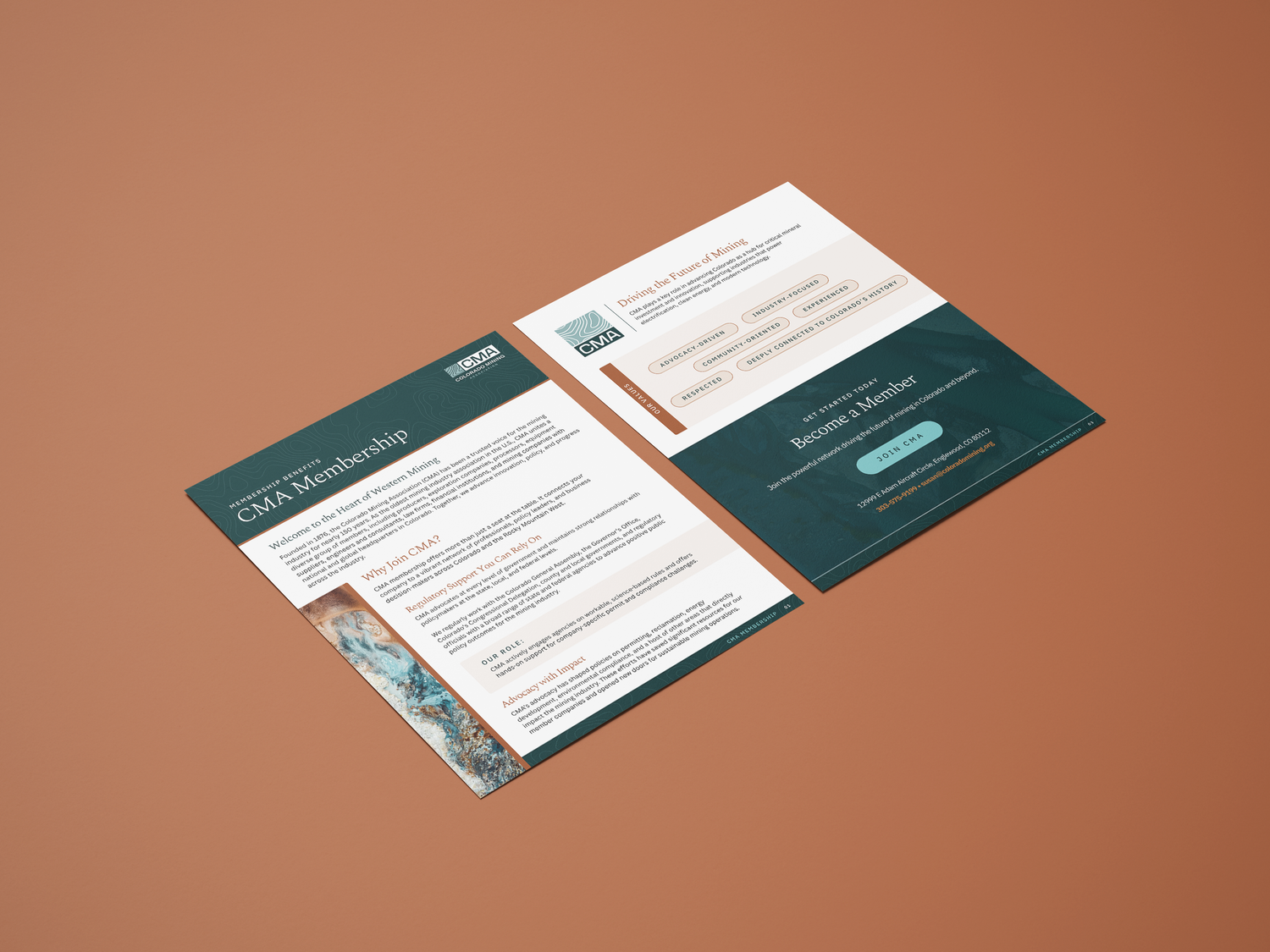 Business cards and letterhead arranged on copper background showcasing corporate branding materials.
