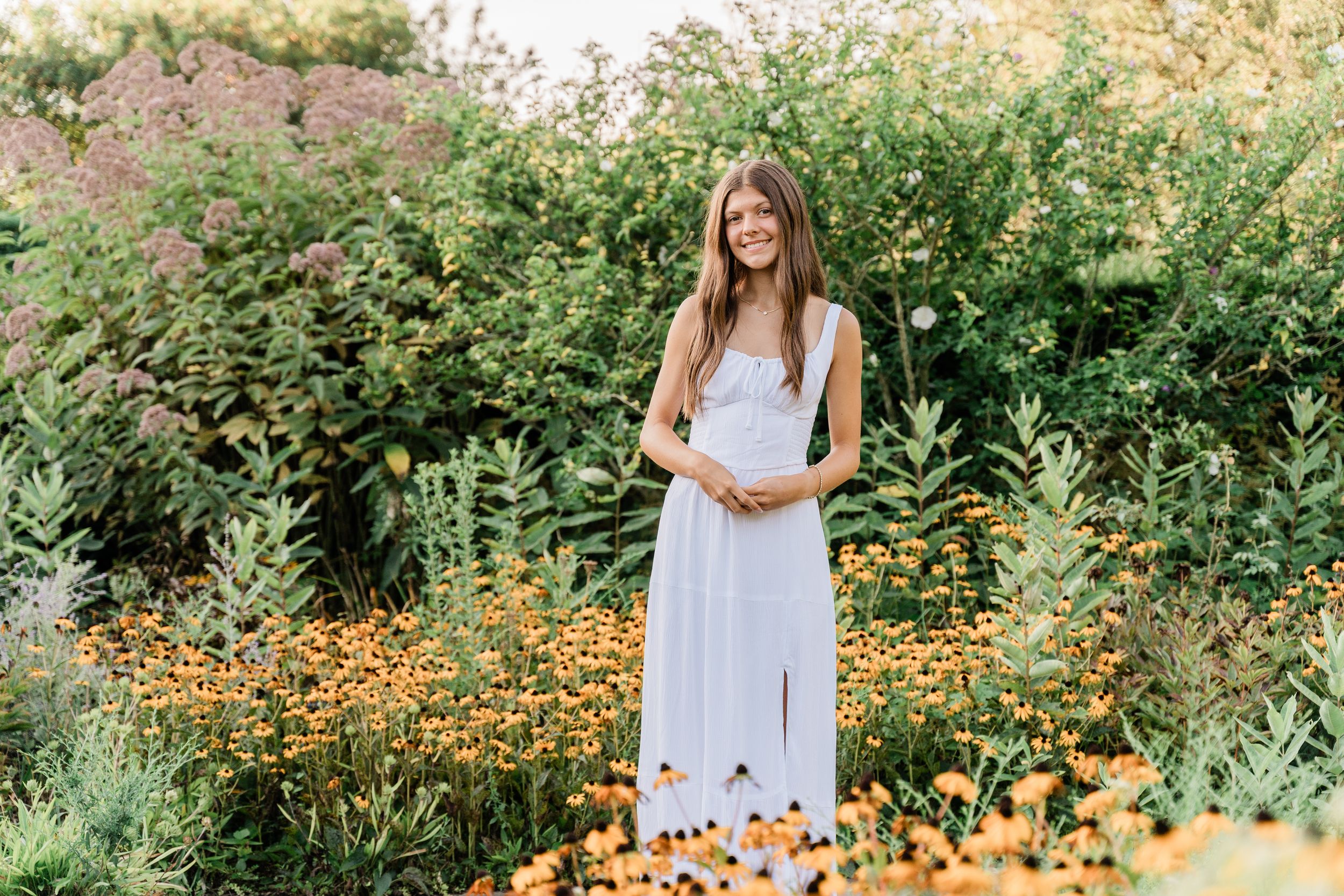 Lush garden landscape with colorful flowers and greenery creating a natural outdoor backdrop.