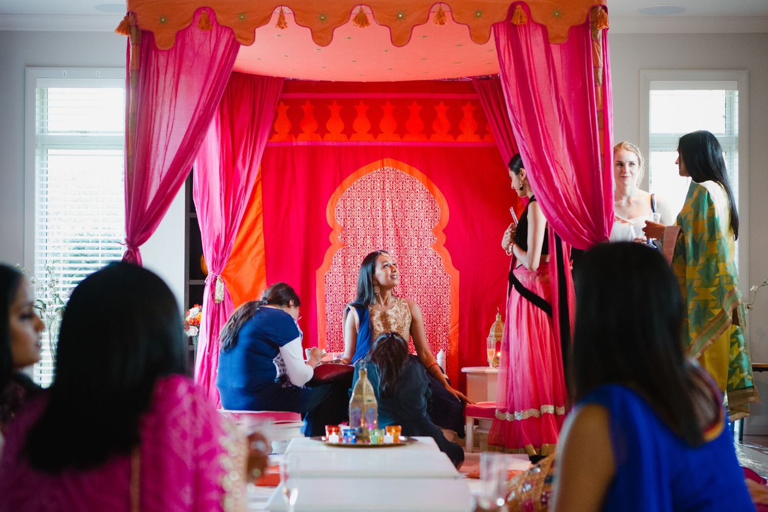 Henna and mehndi night photos from Indian wedding of Bride having her mehndi done by a henna artist