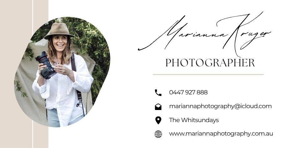 Marianna Kruger photographer business card with contact details, featuring a woman holding a camera in the Whitsundays.