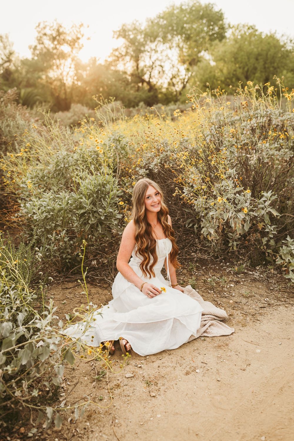 a simple white dress to complete graduation photos in redlands ca