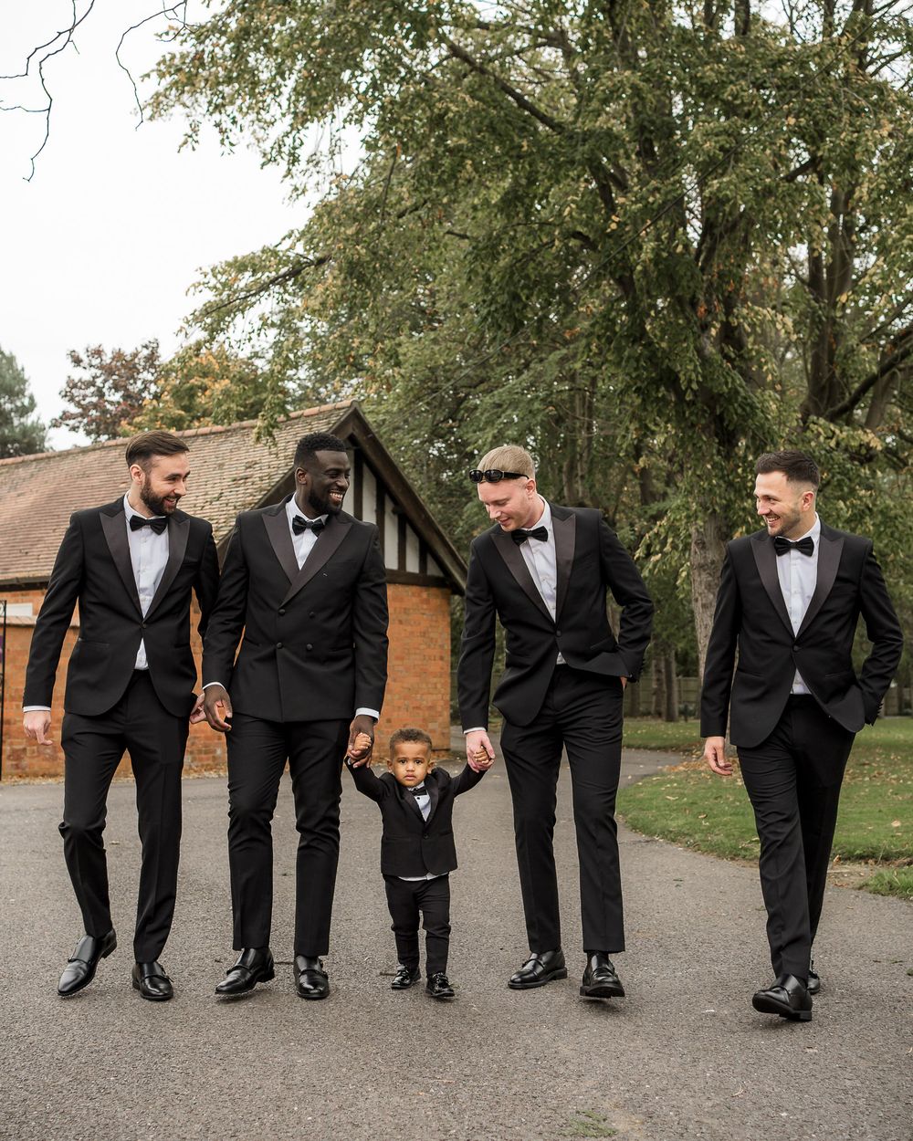 Groom and groomsmen getting ready wedding day Kelham House